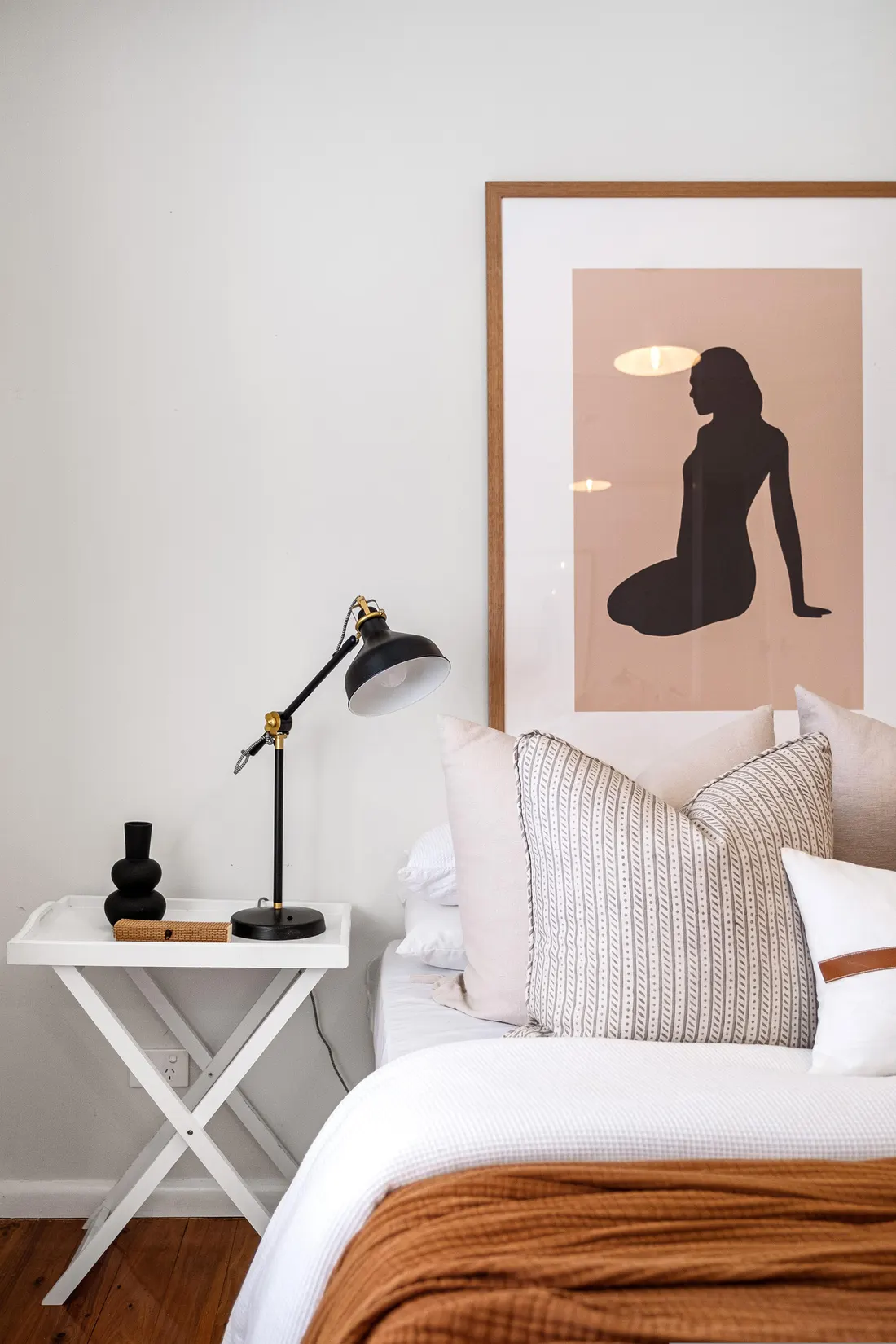 Virtually staged bedroom with warm styling in a property listing photo